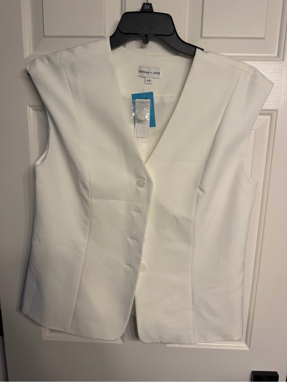 White Sleeveless Button-Front Blazer